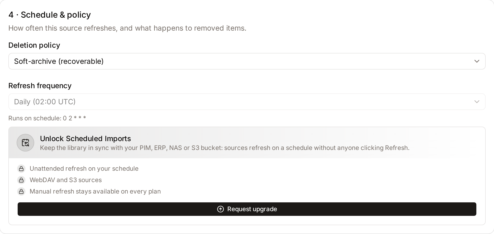 The Schedule & policy step on the Edit page with the Refresh frequency field locked and the plan upgrade notice below it