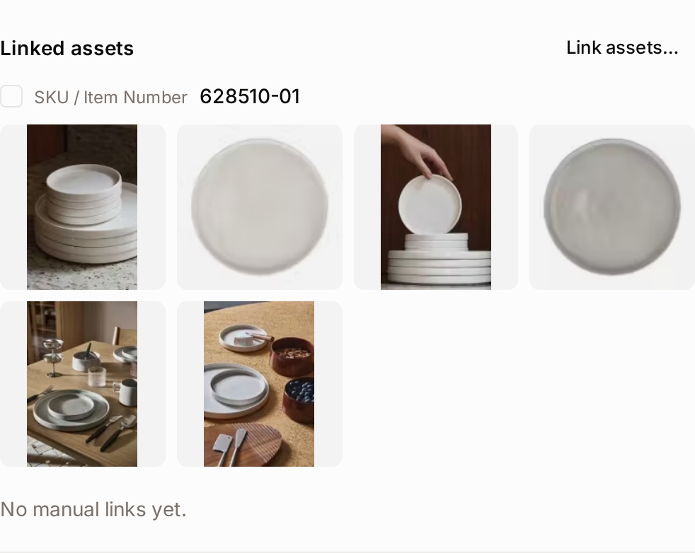 The Linked assets section of the asset page, with a manual link band and metadata link bands